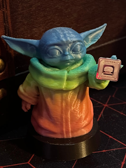 Painted (Blue/Rainbow) 3D Printed Grogu holding 1 gram Geiger bar